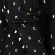 Maglia Greta stampa nera disegni oro