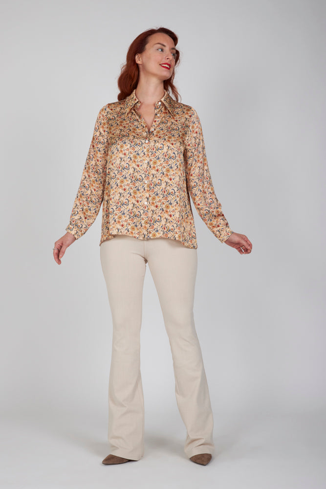 Jeans flare beige con baschina in punto Milano stretch