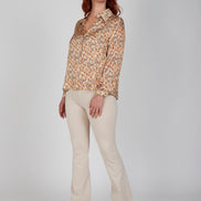 Jeans flare beige con baschina in punto Milano stretch