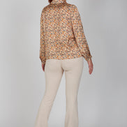 Jeans flare beige con baschina in punto Milano stretch