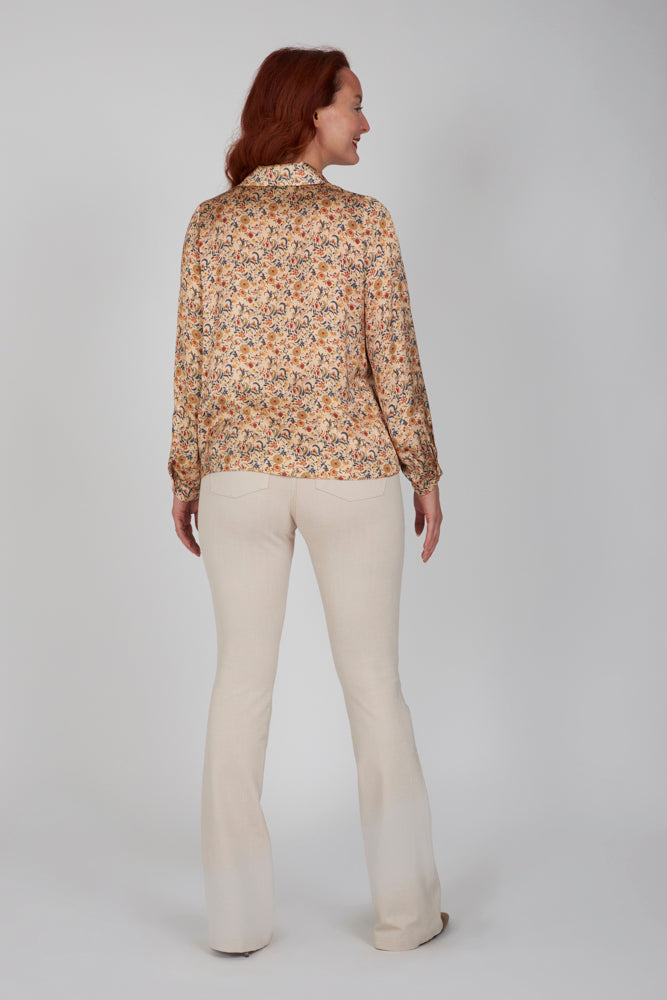 Jeans flare beige con baschina in punto Milano stretch
