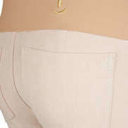 Jeans flare beige con baschina in punto Milano stretch