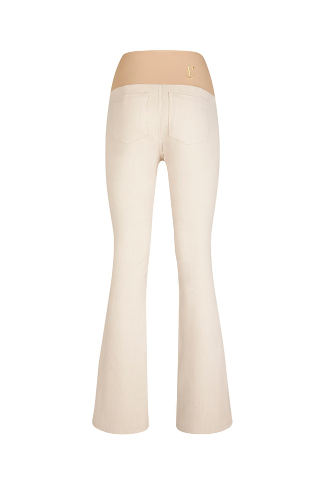 Jeans flare beige con baschina in punto Milano stretch