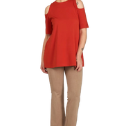 Look maglia arancio e panta caffelatte