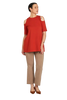 Look maglia arancio e panta caffelatte